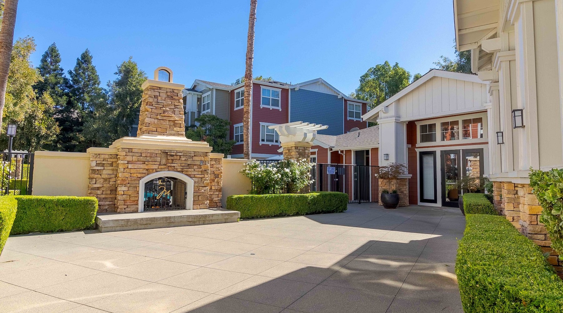 a courtyard area with a large chimney
