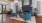 a living room with blue chairs
