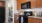a kitchen with wooden cabinets